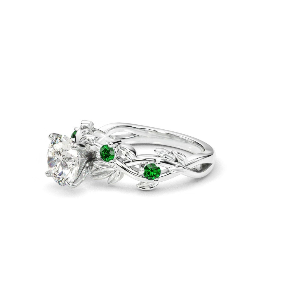 360 degree view of Flamenco Emerald Twisted Vine & Leaf Engagement Ring